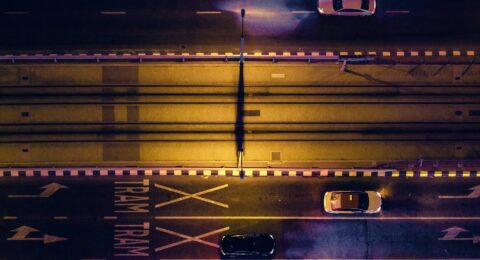 aerial-view-of-cars-on-gray-highway-1233255