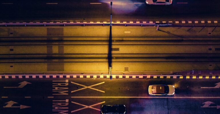 aerial-view-of-cars-on-gray-highway-1233255