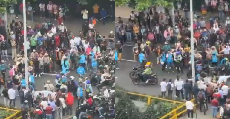 Motociclistas y peatones se enfrentaron con la minga indígena en Medellín para reabrir el paso vehicular en el sector de La Alpujarra