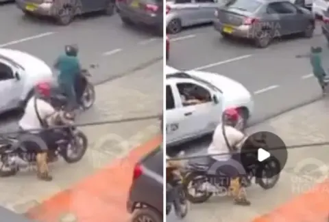 En video, un motociclista robó a una mujer y luego un ciudadano lo derribó: en el forcejeo, el hijo de la víctima del hurto recibió un disparo en Cali
